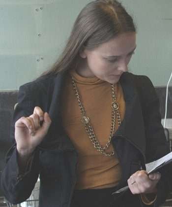 Camerawoman Meg Rennie Black Jacket